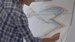 Woman artist drawing in art studio Stock Footage