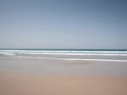 Jogging at the beach Stock Footage