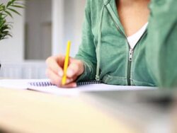 Designer/Student at desk Stock Footage