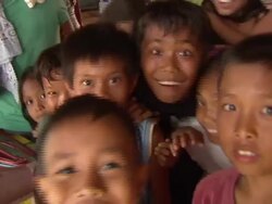 Happy smiling children playing in front of camera News Clip