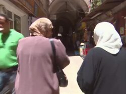 MS TS Two women walking through marketplace  Audio / Jerusalem, Jerusalem, Israel Stock Footage