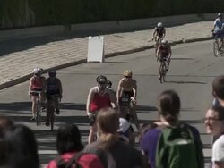 WS Triathletes descending hill / Chicago, Illinois, USA Stock Footage