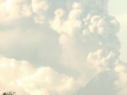 Major eruption at Merapi volcano sends ash high into atmosphere close up; Indonesia. 7 November 2010 / AUDIO Stock Footage