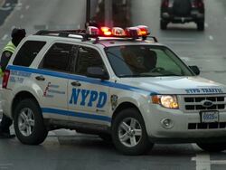 Traffic Cops get out of a police car and put out traffic cones. Stock Footage