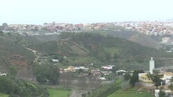 CLEAN : Hundreds of migrants storm Spain's Ceuta fence News Clip