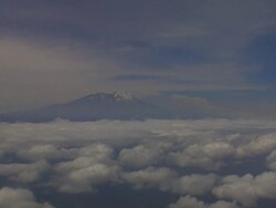 Peak of Mt Kilimanjaro from airplane, Tanzania Stock Footage