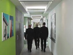 HD DOLLY: CEO Walking With Two Executives Stock Footage