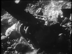 B/W 1930s close up tilt up dragline scooping up rubble in dam construction / Tennessee River Valley Stock Footage