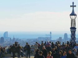 WS View of colorful Mosaic statues with tourist overlooking city from Guell Park / Barcelona, Catalonia, Spain Stock Footage