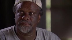 Some abandoned homes, unkempt yards, and for sale signs are evidence of the aftermath of Hurricane Katrina in a New Orleans neighborhood. Stock Footage