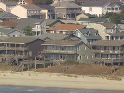 MS AERIAL Shot of wooden houses at Holden beach / North Carolina, United States Stock Footage