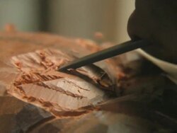 ECU Sculptor chiseling wood / Havana, Cuba Stock Footage