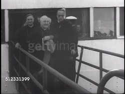1950: PILGRIMS ARRIVE FROM AMERICA: His Eminence Archbishop of New York Francis Cardinal Spellman (1889-1967) leading others off docked ship.  Pilgrimage to the Eternal City, Holy Year, Pilgrims, Catholic. Instructional Video