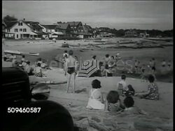 1938: SUMMER VACATION: WS Trailer parked riverside w/ children in water, adults in boat. WS People on beach at inlet w/ houses BG. Eight boys in bathing trunks hurrying, trying to get into passenger's side car. WS Children playing in shallow water. Instructional Video
