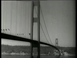 B/W 1940's low angle of Tacoma Narrows Bridge / SOUND Stock Footage