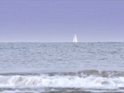 Sailing ship yacht at the horizon, selective focus Stock Footage