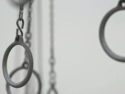 The Santa Monica traveling rings swinging freely in the air. - Slow Motion Stock Footage