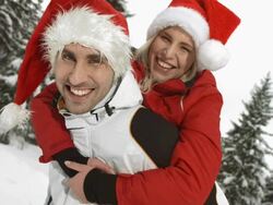 HD Super Slow-Mo: Happy Couple With Santa Hats Stock Footage