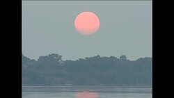 Sun Rise Over River at Zambezi National Park News Clip