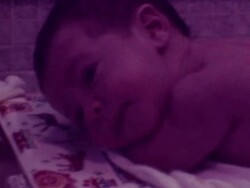 8mm footage - 70's- infant  being bathed Stock Footage