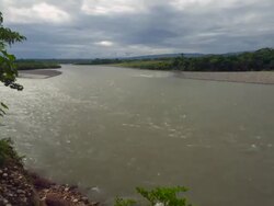 Rio Napo, Ecuador with the Andes Mountains in the distance. The Napo is a major tributary of the Amazon. Stock Footage