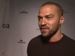 INTERVIEW - Jesse Williams wanted to come out and support the GQ event.  He shares who he thinks is the best dressed athlete of all times.  He thinks Dion Sanders had the best touchdown dance Stock Footage