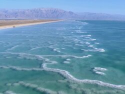 Aerial Dead Sea salt formations, low ride towards north, Israel , southern Judea Desert Stock Footage