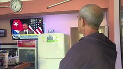 CLEAN : Cubans US tourists watch Obama speech in Havana News Clip