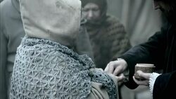 Nostradamus gives a woman medicine and she eats it. Stock Footage