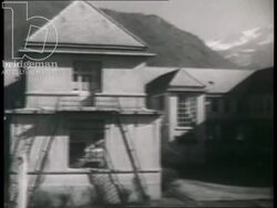 A headmistress describes girls' school to new teacher. France, 1942 Stock Footage