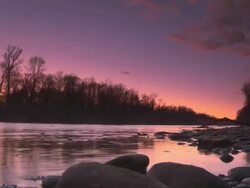 HD TIME LAPSE: Sunset Over The River Stock Footage