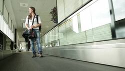 Solo Woman Traveler at Airport Stock Footage