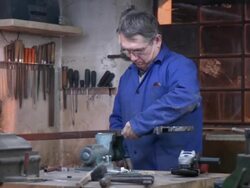 HD DOLLY: Worker Using A Table Clamp Stock Footage