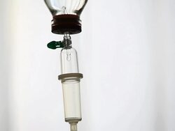 MACRO Intravenous drip in sick room Stock Footage