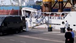Coastguard arrives at port with bodies, survivors Instructional Video