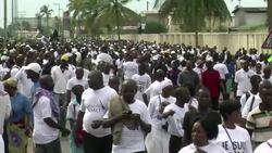 CLEAN : Tens of thousands greet Gabon opposition leaders coffin News Clip