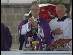 Mass funeral for quake victims, Berlusconi, mourners News Clip