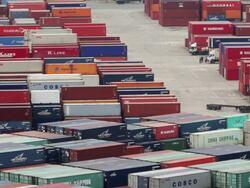 HA, LS Busy shipping container terminal with trucks moving containers / Busan, South Korea Stock Footage