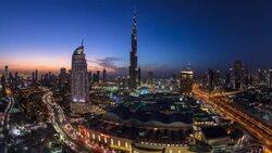 United Arab Emirates, Dubai, the Burj Khalifa, elevated view looking over the Dubai Mall - time lapse Stock Footage