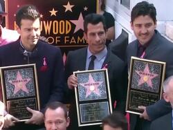 New Kids On The Block posing with plaques at New Kids On The Block honored with star on the Hollywood Walk of Fame in Hollywood Stock Footage