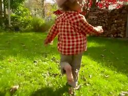  WS SLO MO TS Shot of little boy running through yard / Tivoli, New York, United States Stock Footage
