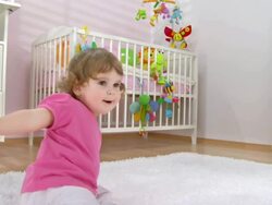 HD: Baby Girl Having Fun On The Carpet Stock Footage