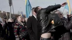 CLEAN : Ukrainians pelt Russia embassy with eggs demand pilots release News Clip