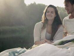Couple awakening on lake Stock Footage