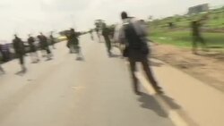 Opposition supporters clash with police as Odinga returns Instructional Video