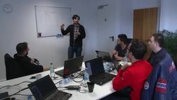 Aslyum seekers learn computer code  +FIRST RUN MAY 9+ News Clip