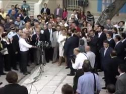 WRAP Polls open in general election ADDS PM Karamanlis voting News Clip