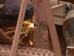 MS Man cutting metal panel by gas cutter / Taben-Rodt, Rhineland-Palatinate, Germany Stock Footage