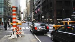 Traffic and pedestrians pass through an intersection near Grand Central Station in New York City. Stock Footage
