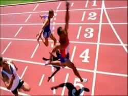 MS relay athletes running over finish line, Australia Stock Footage